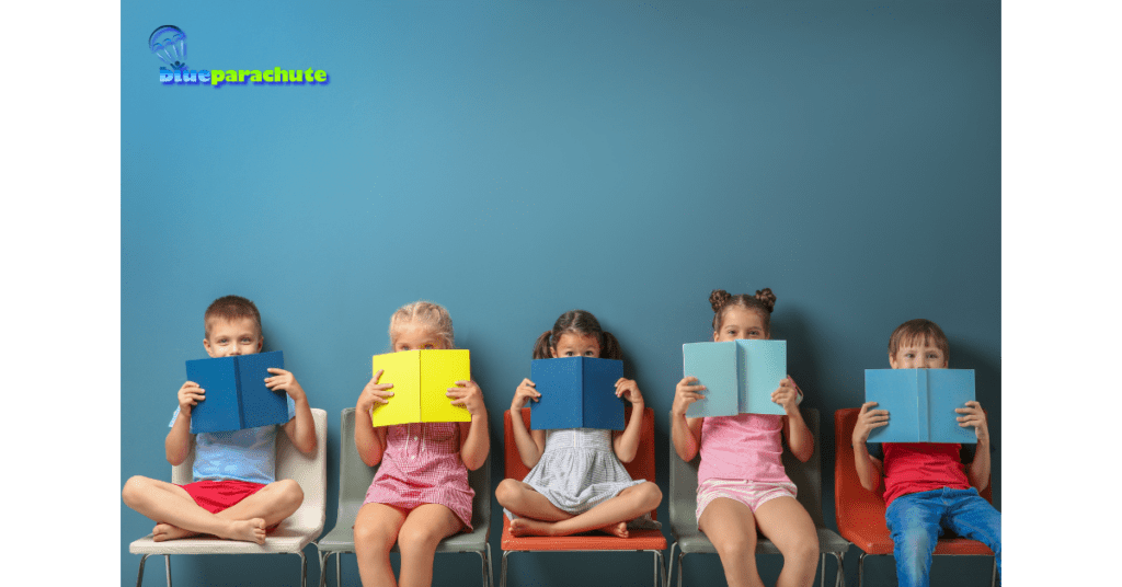 Five children are sitting on school chairs and holding books in front of their faces. This image implies that the article is about Autism and Reading Tips to Help Your Child.